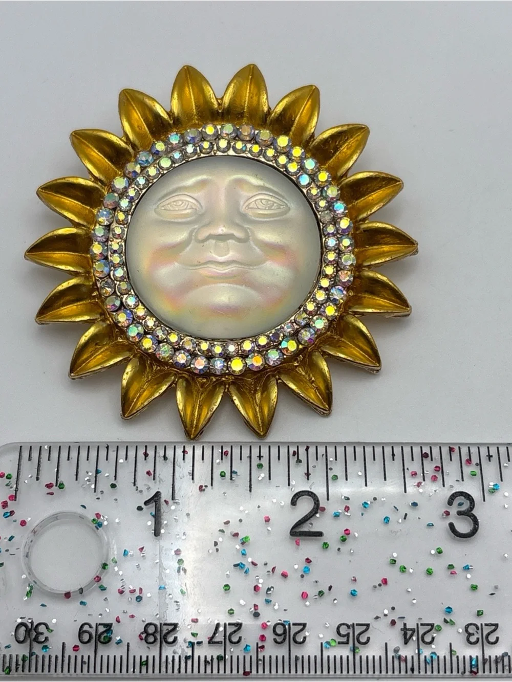 Iridescent Moon Face Sunburst Brooch with Aurora Rhinestones